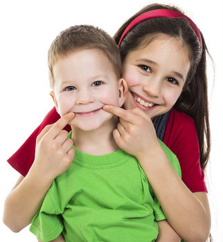 Children smiling after getting dental sealants at Timothy H. Kindt, DDS in Mesa, AZ 