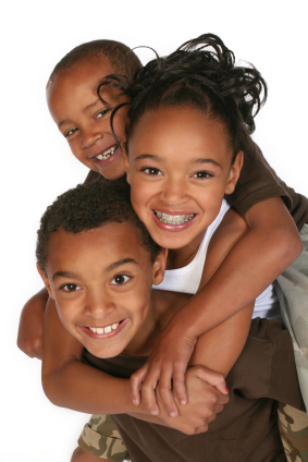 Children smiling together about their fun visit to their dentist in , .